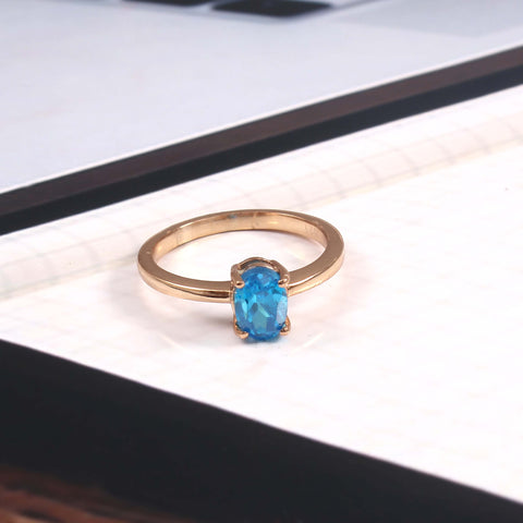 Elegant Rose Gold Blue Topaz Ring: A Timeless Piece of Jewelry