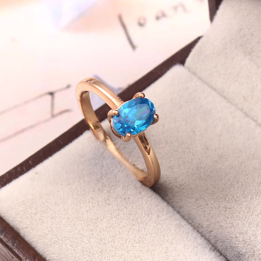 Elegant Rose Gold Blue Topaz Ring: A Timeless Piece of Jewelry